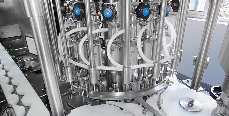 DTNX-60XB automatic dropper bottle filling and capping machine processing essential oils in a cleanroom environment